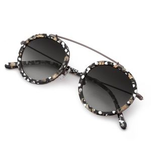 Krewe Conti round sunglasses in the color Plume